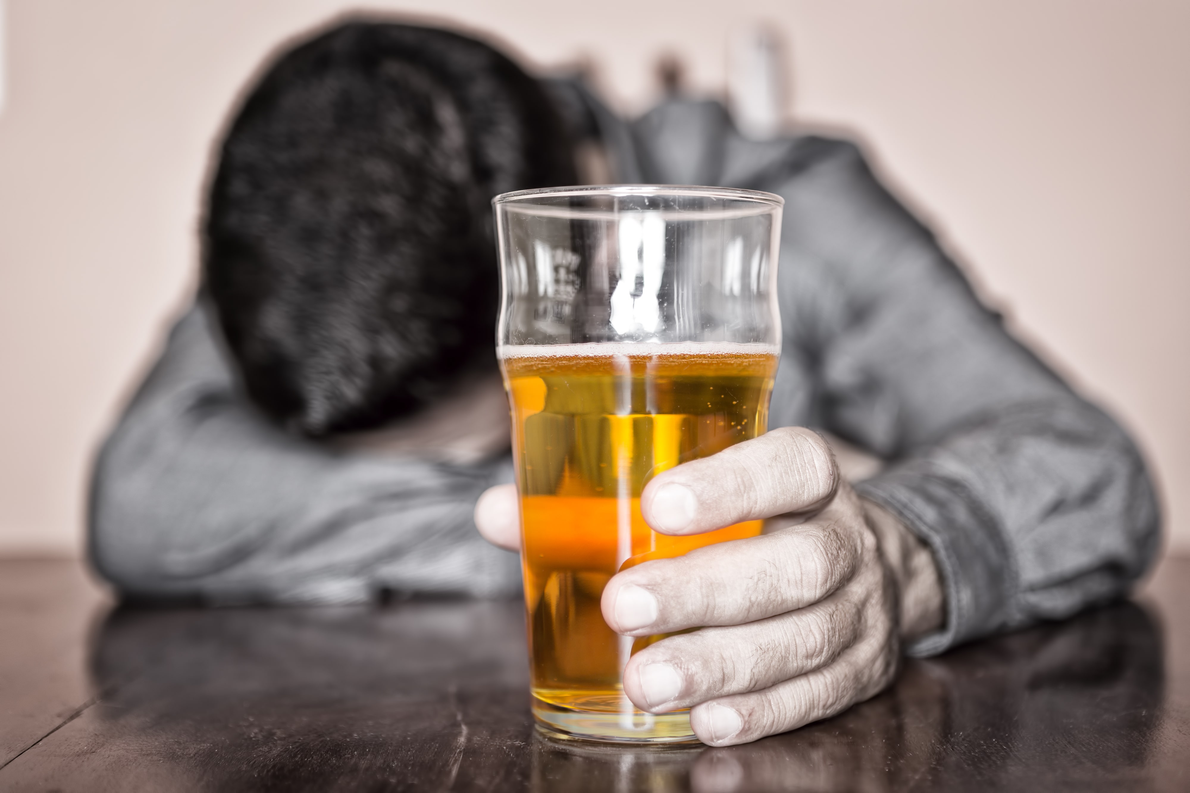 man holding beer